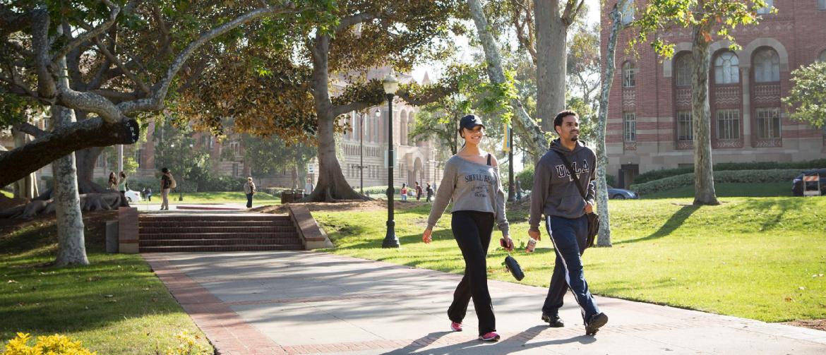 two students walking on bruinwalk